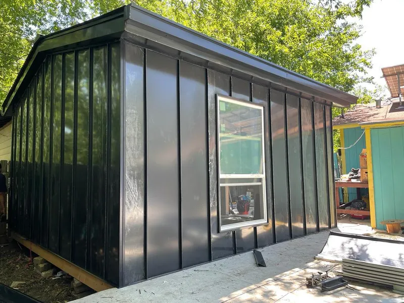 Black standing seam metal wall panels for Metal Roof Installation in Gulf Gate